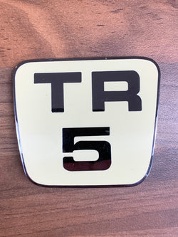 DAMAGED TR5 BONNET BADGE